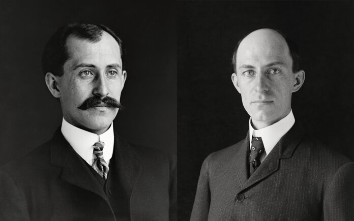 Wright Brothers - Orville Wright on the left, and Wilbur Wright on the right